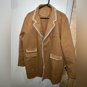Brown Vintage coats layer with details on it